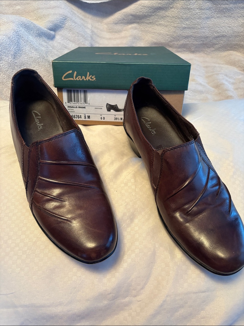 Clarks women’s Slip-On Leather Loafers in Brown